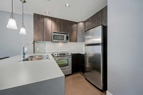 609-788 12 Avenue Sw, Calgary, AB - Indoor Photo Showing Kitchen With Stainless Steel Kitchen With Double Sink With Upgraded Kitchen