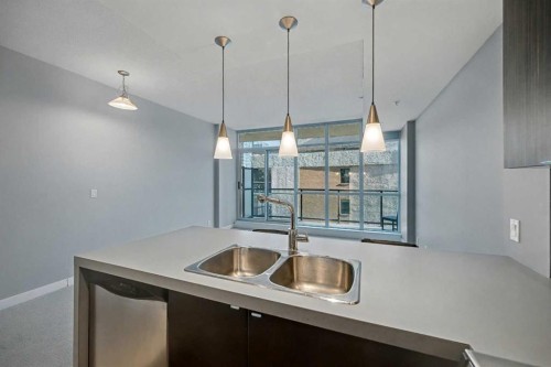 609-788 12 Avenue Sw, Calgary, AB - Indoor Photo Showing Kitchen With Double Sink