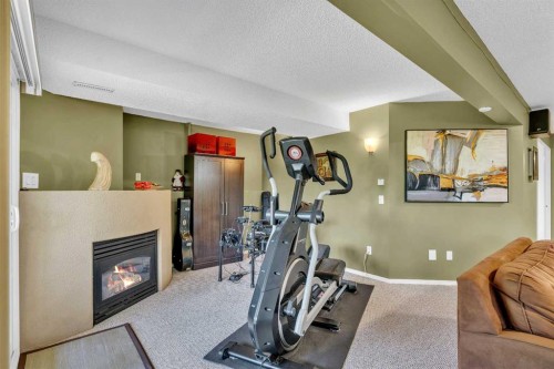 46 Somerside Manor Sw, Calgary, AB - Indoor Photo Showing Gym Room