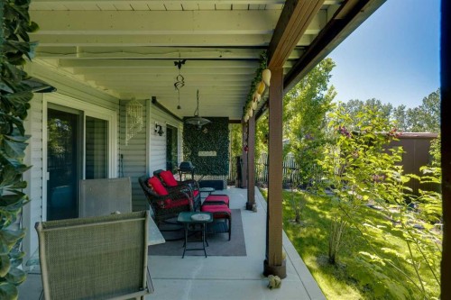 46 Somerside Manor Sw, Calgary, AB - Outdoor With Deck Patio Veranda