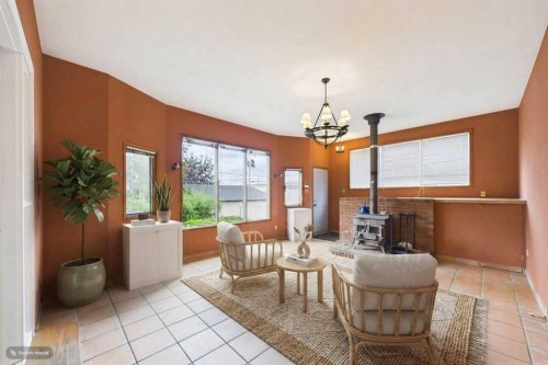 28 Franklin Drive Se, Calgary, AB - Indoor Photo Showing Other Room With Fireplace