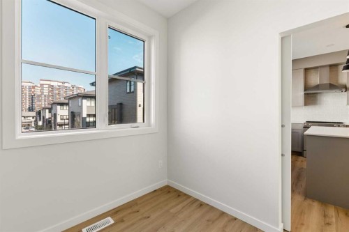 414-1453 Na'A Drive Sw, Calgary, AB - Indoor Photo Showing Other Room
