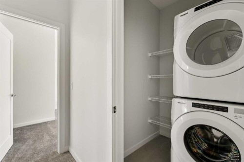 414-1453 Na'A Drive Sw, Calgary, AB - Indoor Photo Showing Laundry Room