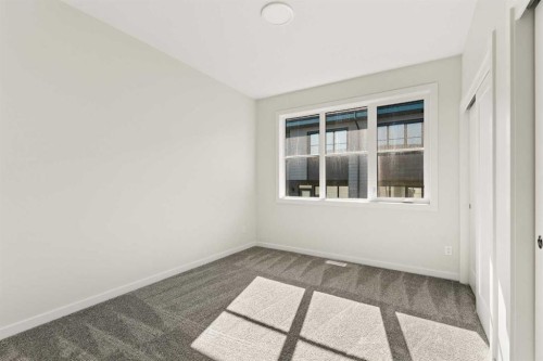 414-1453 Na'A Drive Sw, Calgary, AB - Indoor Photo Showing Other Room