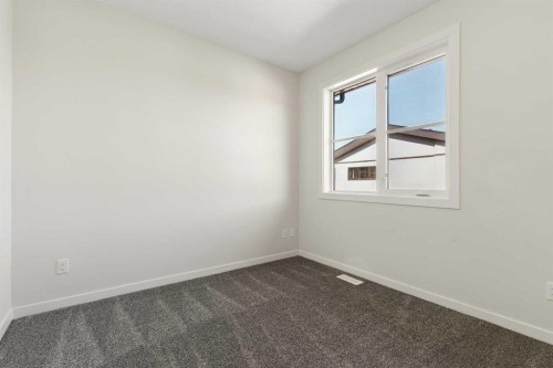 414-1453 Na'A Drive Sw, Calgary, AB - Indoor Photo Showing Other Room