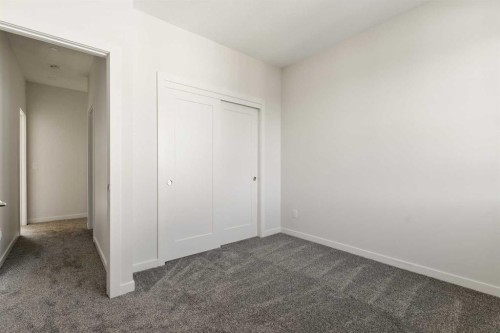 414-1453 Na'A Drive Sw, Calgary, AB - Indoor Photo Showing Other Room