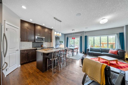 64 Sunrise Terrace, Cochrane, AB - Indoor Photo Showing Other Room