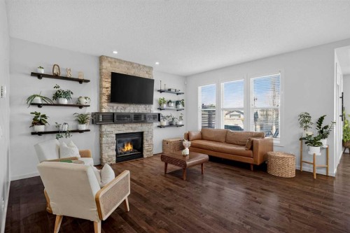 367 Mahogany Terrace Se, Calgary, AB - Indoor Photo Showing Living Room With Fireplace