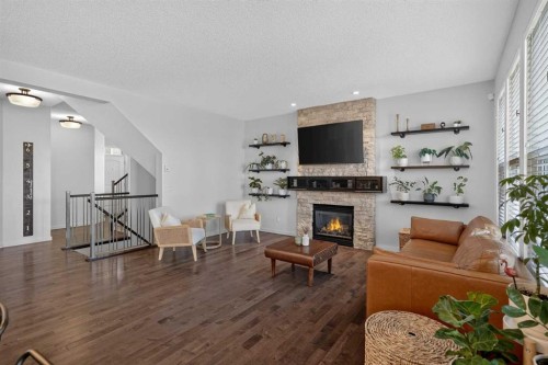 367 Mahogany Terrace Se, Calgary, AB - Indoor Photo Showing Living Room With Fireplace