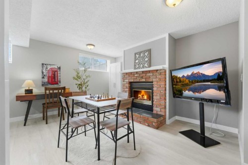 55 Sunbank Road Se, Calgary, AB - Indoor With Fireplace