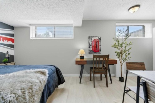 55 Sunbank Road Se, Calgary, AB - Indoor Photo Showing Bedroom