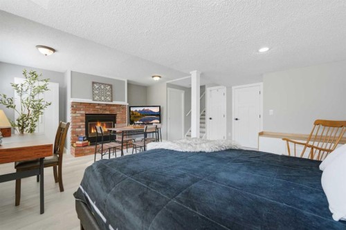 55 Sunbank Road Se, Calgary, AB - Indoor With Fireplace