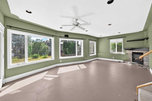 311 Royal Crest Bay Nw, Calgary, AB - Indoor With Fireplace