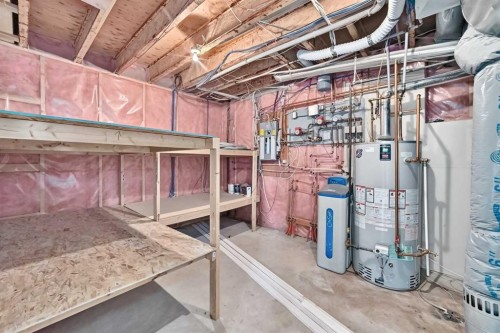 311 Royal Crest Bay Nw, Calgary, AB - Indoor Photo Showing Basement