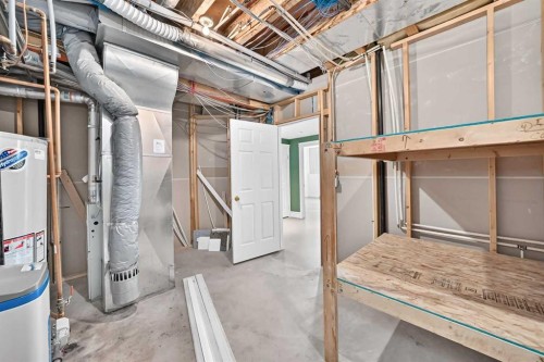 311 Royal Crest Bay Nw, Calgary, AB - Indoor Photo Showing Basement