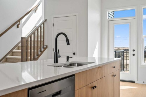 659 Chelsea Pier Run, Chestermere, AB - Indoor Photo Showing Kitchen With Double Sink