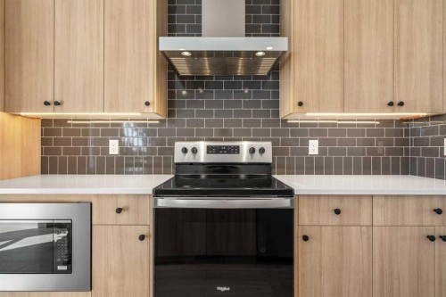659 Chelsea Pier Run, Chestermere, AB - Indoor Photo Showing Kitchen