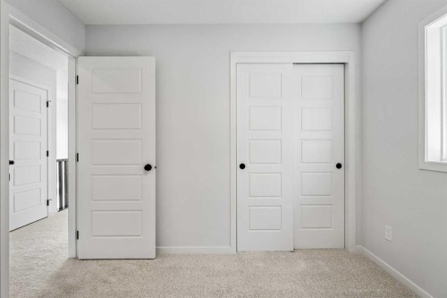 659 Chelsea Pier Run, Chestermere, AB - Indoor Photo Showing Other Room