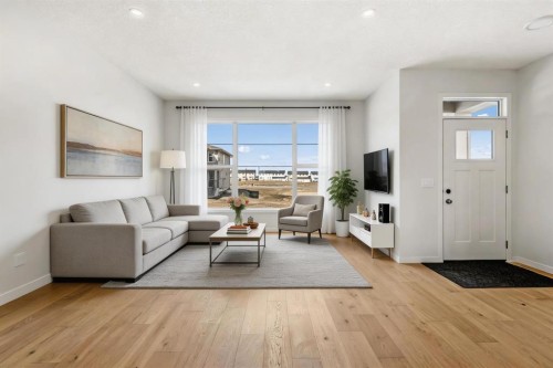 659 Chelsea Pier Run, Chestermere, AB - Indoor Photo Showing Living Room