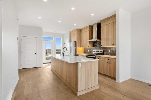 659 Chelsea Pier Run, Chestermere, AB - Indoor Photo Showing Kitchen With Upgraded Kitchen