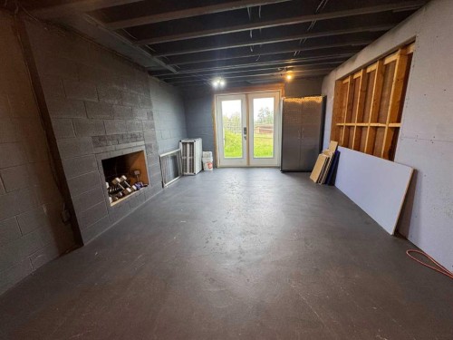 33374 Range Road 55, Rural Mountain View County, AB - Indoor With Fireplace