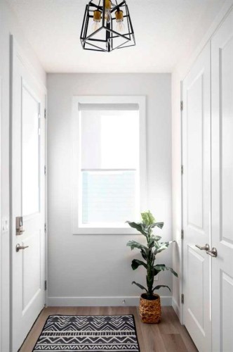 79 Waterford Mews, Chestermere, AB - Indoor Photo Showing Other Room