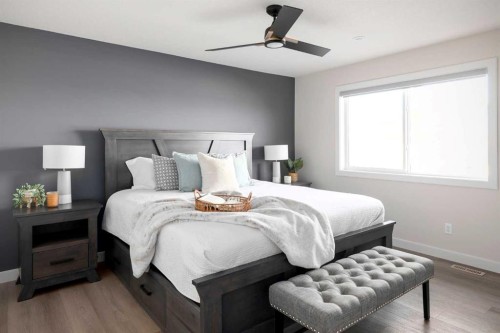 79 Waterford Mews, Chestermere, AB - Indoor Photo Showing Bedroom