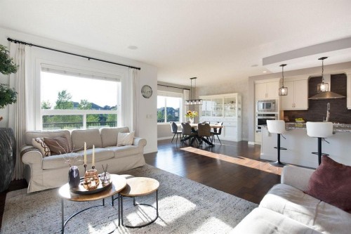 213 Kingsmere Cove Se, Airdrie, AB - Indoor Photo Showing Living Room