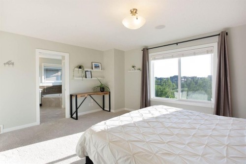 213 Kingsmere Cove Se, Airdrie, AB - Indoor Photo Showing Bedroom