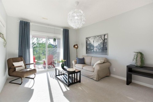 213 Kingsmere Cove Se, Airdrie, AB - Indoor Photo Showing Living Room
