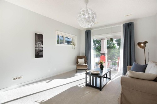 213 Kingsmere Cove Se, Airdrie, AB - Indoor Photo Showing Living Room