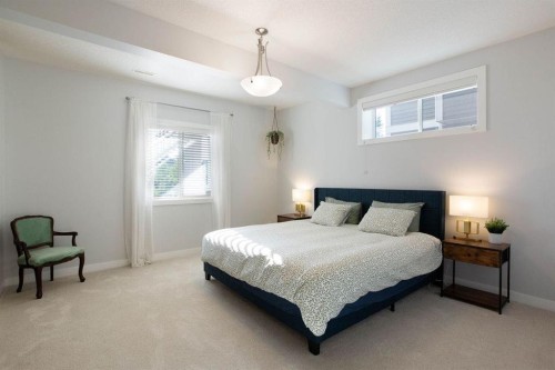213 Kingsmere Cove Se, Airdrie, AB - Indoor Photo Showing Bedroom