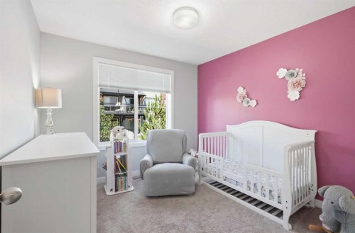 204 Jumping Pound Common, Cochrane, AB - Indoor Photo Showing Bedroom