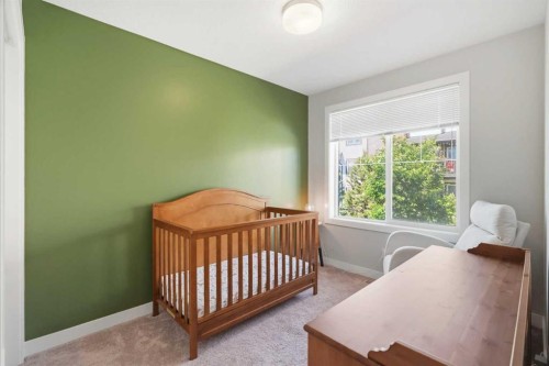 204 Jumping Pound Common, Cochrane, AB - Indoor Photo Showing Bedroom