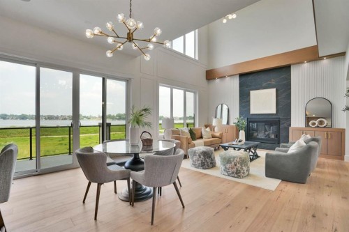 952 South Shore Terrace, Chestermere, AB - Indoor Photo Showing Other Room With Fireplace