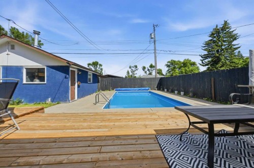 4420 3 Street Ne, Calgary, AB - Outdoor With In Ground Pool With Deck Patio Veranda
