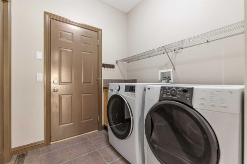 49 Panamount Rise Nw, Calgary, AB - Indoor Photo Showing Laundry Room