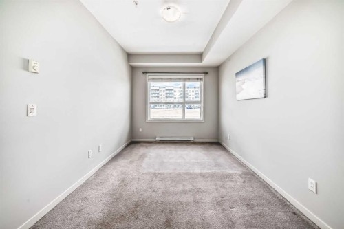 215-20 Seton Park Se, Calgary, AB - Indoor Photo Showing Other Room
