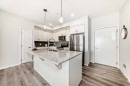 215-20 Seton Park Se, Calgary, AB  - Indoor Photo Showing Kitchen With Double Sink With Upgraded Kitchen 