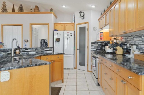 1706 3 Avenue Se, High River, AB - Indoor Photo Showing Kitchen With Double Sink