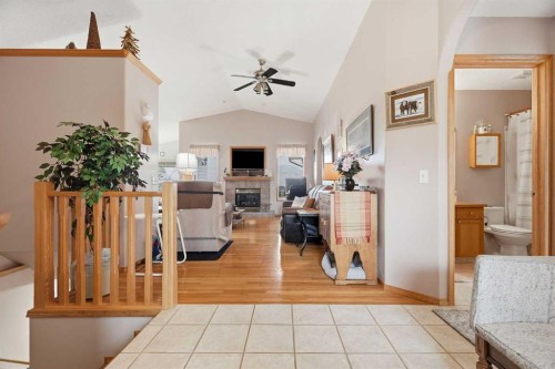 1706 3 Avenue Se, High River, AB - Indoor Photo Showing Other Room With Fireplace