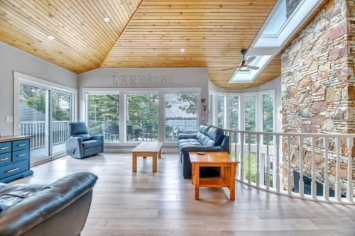601 East Chestermere Drive, Chestermere, AB - Indoor Photo Showing Living Room