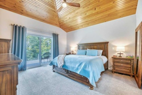 601 East Chestermere Drive, Chestermere, AB - Indoor Photo Showing Bedroom