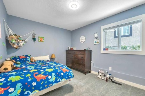 601 East Chestermere Drive, Chestermere, AB - Indoor Photo Showing Bedroom
