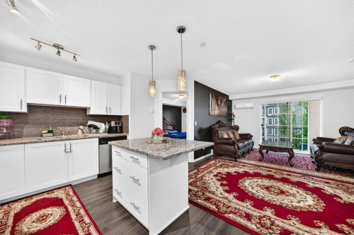4310-755 Copperpond Boulevard Se, Calgary, AB - Indoor Photo Showing Kitchen With Upgraded Kitchen