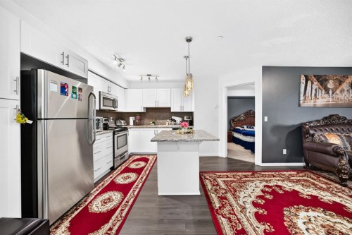 4310-755 Copperpond Boulevard Se, Calgary, AB - Indoor Photo Showing Kitchen