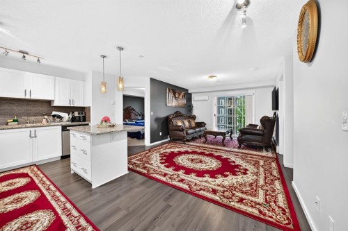 4310-755 Copperpond Boulevard Se, Calgary, AB - Indoor Photo Showing Kitchen With Upgraded Kitchen