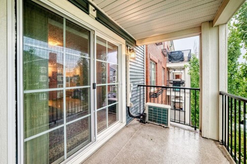 4310-755 Copperpond Boulevard Se, Calgary, AB - Outdoor With Deck Patio Veranda With Exterior