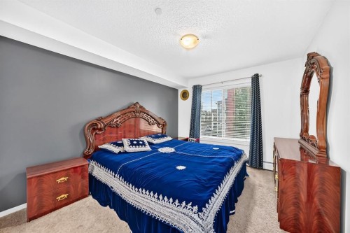 4310-755 Copperpond Boulevard Se, Calgary, AB - Indoor Photo Showing Bedroom