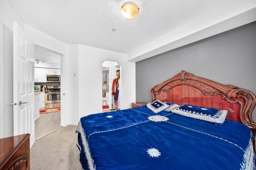 4310-755 Copperpond Boulevard Se, Calgary, AB - Indoor Photo Showing Bedroom